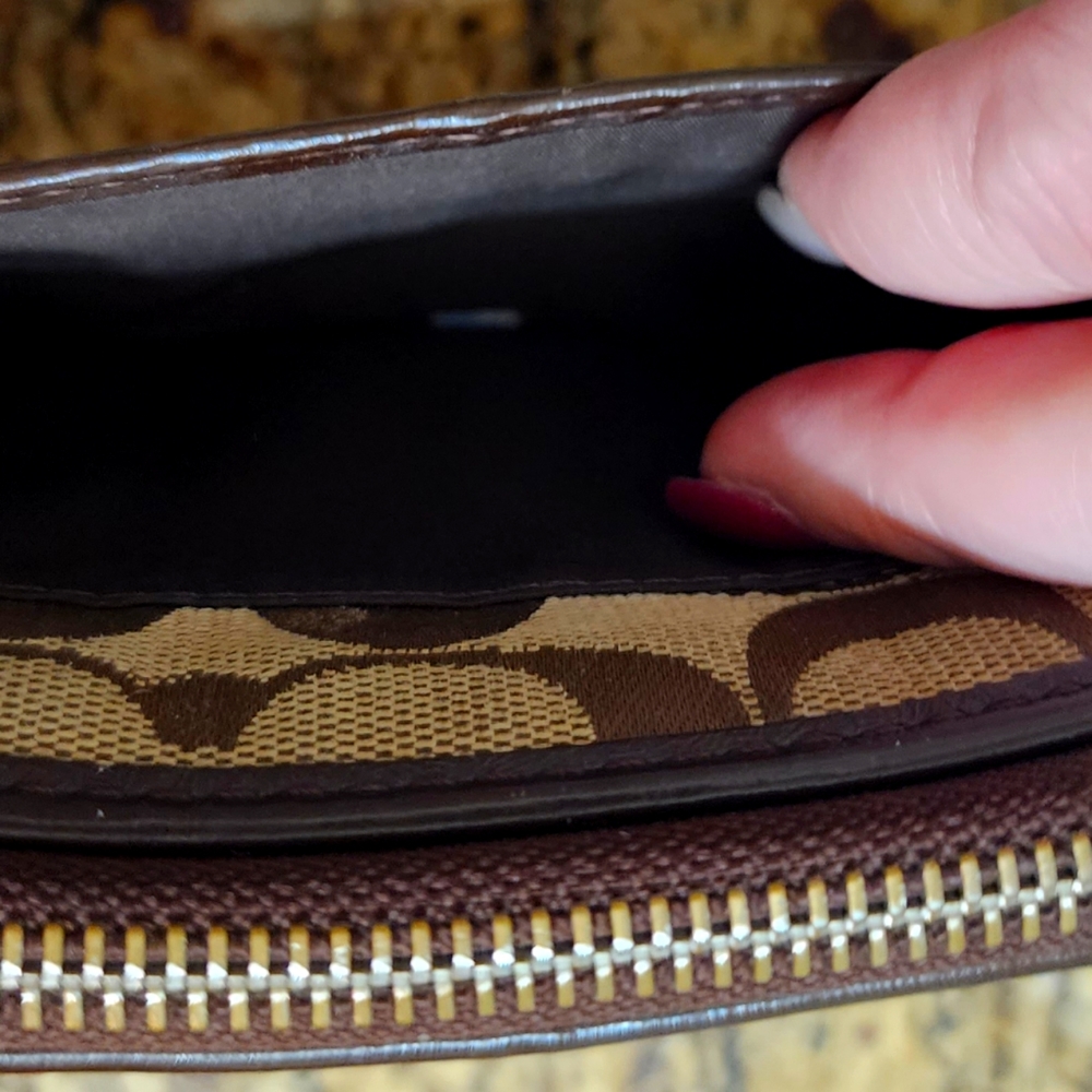 Signature cloth COACH zip wallet